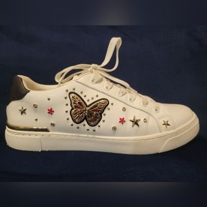 White Aldo sneakers with gold butterfly detail